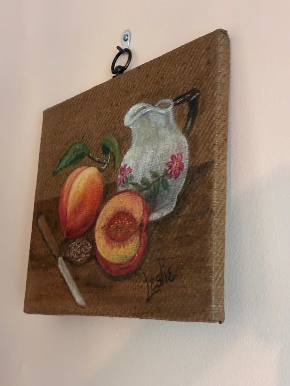 Still Life Painting of Peaches pitcher on burlap